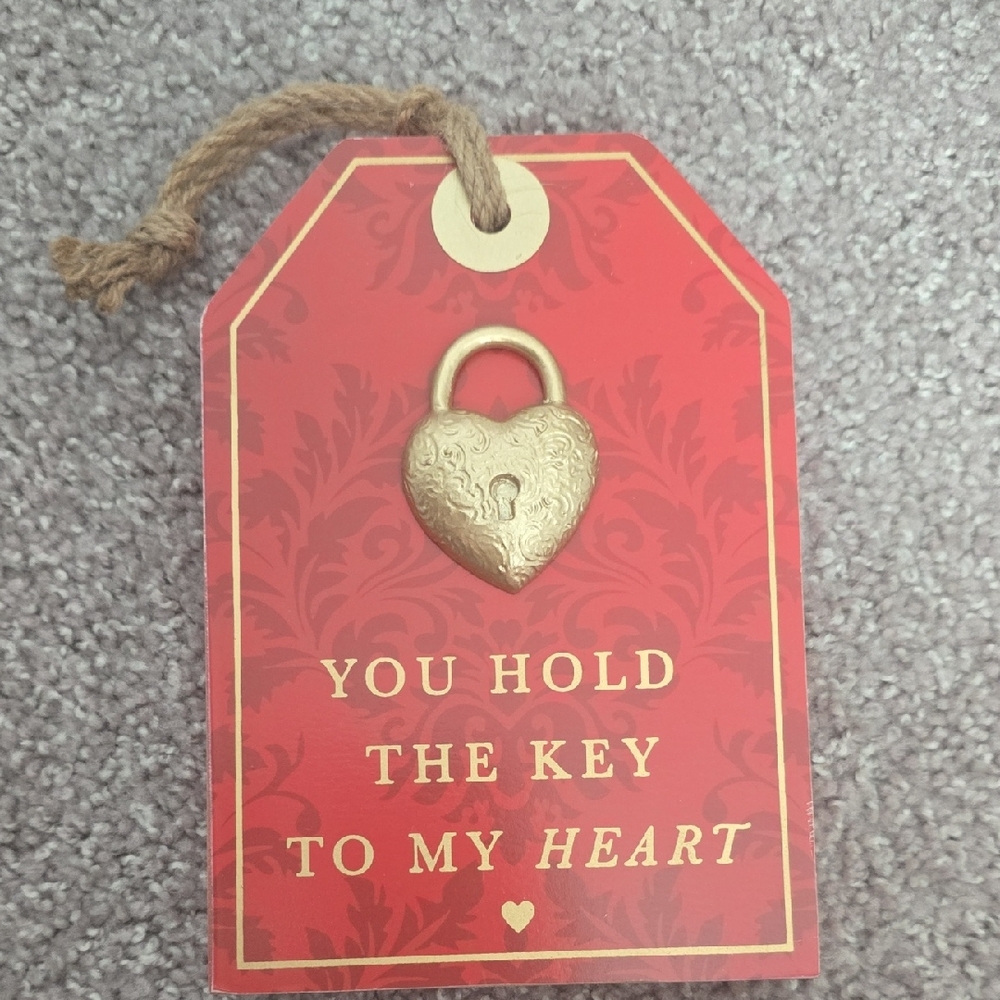 Gold Heart Lock Keychain on Red Tag